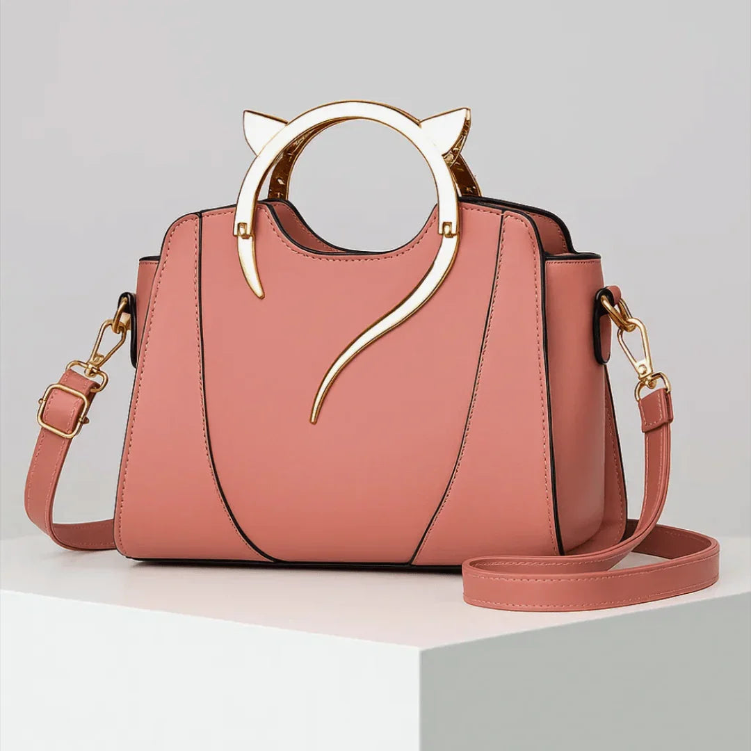 The Golden Tail Handbag
