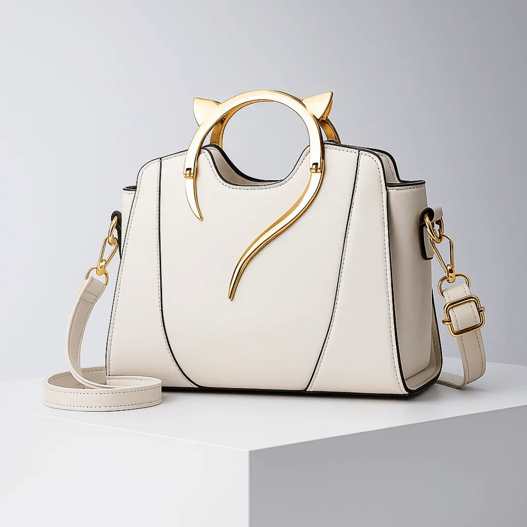 The Golden Tail Handbag