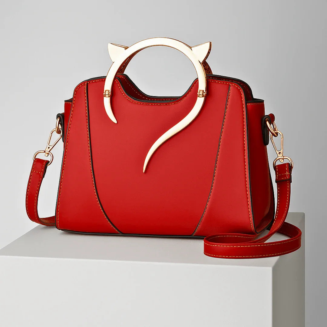 The Golden Tail Handbag